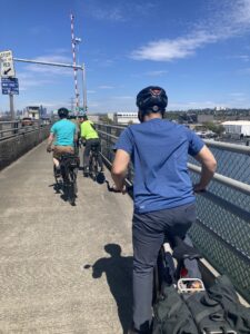 Group of bike riders on First Avenue South Bridge.
