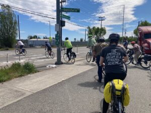 Group of bike riders crossing street